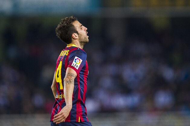 SAN SEBASTIAN, SPAIN - FEBRUARY 12: Cesc Fabregas of FC Barcelona reacts during the Copa del Rey Semi-Final first leg match betweenReal Sociedad and Barcelona at Estadio Anoeta on February 12, 2014 in San Sebastian, Spain. (Photo by Juan Manuel Serrano Arce/Getty Images) SAN SEBASTIAN, SPAIN - FEBRUARY 12: Cesc Fabregas of FC Barcelona reacts during the Copa del Rey Semi-Final first leg match betweenReal Sociedad and Barcelona at Estadio Anoeta on February 12, 2014 in San Sebastian, Spain. (Photo by Juan Manuel Serrano Arce/Getty Images)