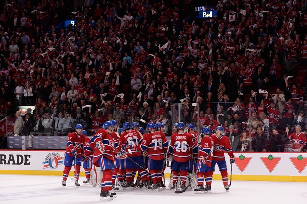 MONTREAL, QC - MAY 27:  Tthe Montreal Canadiens celebrates after defeating the New York Rangers during Game Five of the Eastern Conference Final in the 2014 NHL Stanley Cup Playoffs at Bell Centre on May 27, 2014 in Montreal, Canada. Canadiens defeated the Rangers 7-4.  (Photo by Richard Wolowicz/Getty Images)