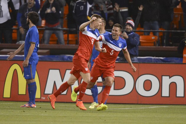May 27, 2014; San Francisco, CA, USA; United States forward Aron Johannsson (9) celebrates after scoring a goal as defender Matt Besler (5) looks on against Azerbaijan during the second half at Candlestick Park. Mandatory Credit: Kyle Terada-USA TODAY Sports