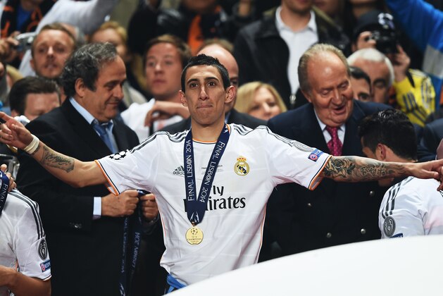 LISBON, PORTUGAL - MAY 24:  Angel Di Maria of Real Madrid celebrates victory after the UEFA Champions League Final between Real Madrid and Atletico de Madrid at Estadio da Luz on May 24, 2014 in Lisbon, Portugal.  (Photo by Laurence Griffiths/Getty Images)