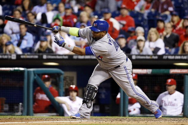 Toronto Blue Jays' Juan Francisco follows through after hitting the go-ahead sacrifice fly off Philadelphia Phillies relief pitcher Antonio Bastardo during the 10th inning of an interleague baseball game, Tuesday, May 6, 2014, in Philadelphia. Toronto won 6-5 in 10 innings. (AP Photo/Matt Slocum)