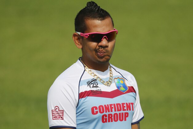 West Indies' Sunil Narine takes part in a training session ahead of their ICC Twenty20 Cricket World Cup match against Australia in Dhaka, Bangladesh, Thursday, March 27, 2014. (AP Photo/Aijaz Rahi) West Indies' Sunil Narine takes part in a training session ahead of their ICC Twenty20 Cricket World Cup match against Australia in Dhaka, Bangladesh, Thursday, March 27, 2014. (AP Photo/Aijaz Rahi)