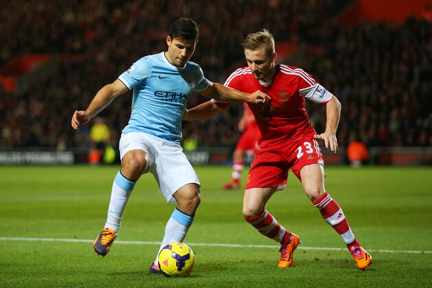 SOUTHAMPTON, ENGLAND - DECEMBER 07:  Luke Shaw of Southampton and Sergio Aguero of Manchester City in action during the Barclays Premier League match between Southampton and Manchester City at St Mary's Stadium on December 7, 2013 in Southampton, England.  (Photo by Bryn Lennon/Getty Images)