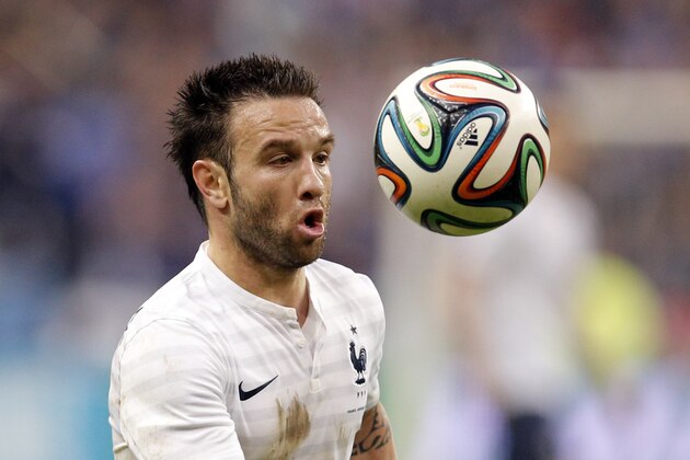 Mathieu Valbuena of France eyes the ball  during the friendly soccer match between France and Norway at the Stade de France stadium in Saint Denis, outside Paris, Tuesday, May 27, 2014. France are preparing for the upcoming soccer World Cup in Brazil starting on 12 June. (AP Photo/Christophe Ena)