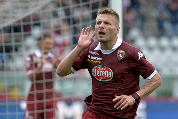 Torino' forward Ciro Immobile celebrates after scoring during a Serie A soccer match between Torino and Udinese at the Olympic  stadium, in Turin, Italy, Sunday, April 27, 2014. (AP Photo/ Massimo Pinca)