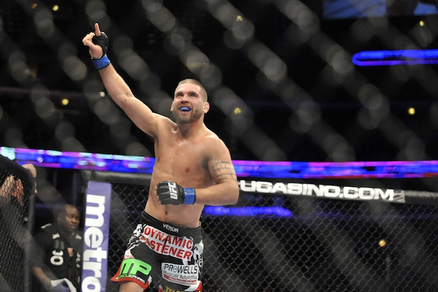 Jan 25, 2014; Chicago, IL, USA; Darren Elkins (red gloves) reacts after beating Jeremy Stephens (not pictured) during UFC on FOX 10 at the United Center. Mandatory Credit: David Banks-USA TODAY Sports