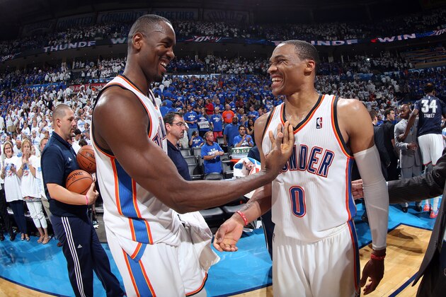 OKLAHOMA CITY, OK  MAY 27: Serge Ibaka #9 and Russell Westbrook #0 of the Oklahoma City Thunder celebrate after a game against the San Antonio Spurs in Game Four of the Western Conference Finals during the 2014 NBA Playoffs on May 27, 2014 at the Chesapeake Energy Arena in Oklahoma City, Oklahoma.  NOTE TO USER: User expressly acknowledges and agrees that, by downloading and or using this photograph, User is consenting to the terms and conditions of the Getty Images License Agreement. Mandatory Copyright Notice: Copyright 2014 NBAE  (Photo by Layne Murdoch/NBAE via Getty Images)