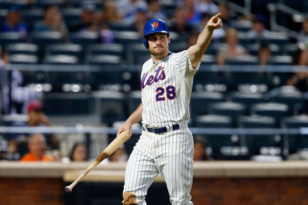NEW YORK, NY - MAY 27:  Daniel Murphy #28 of the New York Mets reacts after scoring a run in the third inning against the Pittsburgh Pirates at Citi Field on May 27, 2014 in the Flushing neighborhood of the Queens borough of New York City.  (Photo by Jim McIsaac/Getty Images)