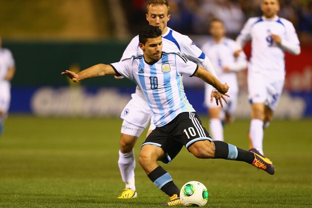 ST. LOUIS, MO - NOVEMBER 18: Sergio Aguero #10 of Argentina passes the ball against Bosnia-Herzegovina during the international friendly match between Bosnia-Herzegovina and Argentina at Busch Stadium on November 18, 2013 in St. Louis, Missouri.  (Photo by Dilip Vishwanat/Getty Images)