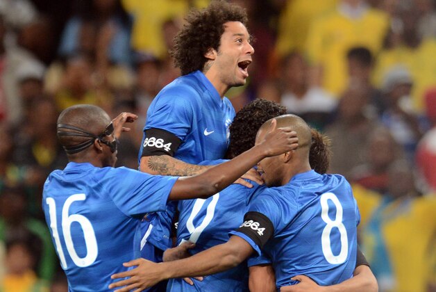 JOHANNESBURG, SOUTH AFRICA - MARCH 05:  Brazilians players celebrates Neymar's goal during the International Friendly match between South Africa and Brazil at FNB Stadium on March 05, 2014 in Johannesburg, South Africa. (Photo by Lefty Shivambu/Gallo Images/Getty Images)