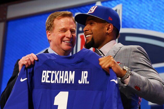 NEW YORK, NY - MAY 08:  Odell Beckham Jr of the LSU Tigers poses with NFL Commissioner Roger Goodell after he was picked #12 overall by the New York Giants during the first round of the 2014 NFL Draft at Radio City Music Hall on May 8, 2014 in New York City.  (Photo by Elsa/Getty Images)
