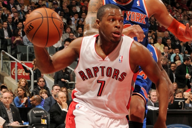TORONTO, CANADA - April 11: Kyle Lowry #7 of the Toronto Raptors drives against the New York Knicks on April 11, 2014 at the Air Canada Centre in Toronto, Ontario, Canada.  NOTE TO USER: User expressly acknowledges and agrees that, by downloading and or using this Photograph, user is consenting to the terms and conditions of the Getty Images License Agreement.  Mandatory Copyright Notice: Copyright 2014 NBAE (Photo by Ron Turenne/NBAE via Getty Images)