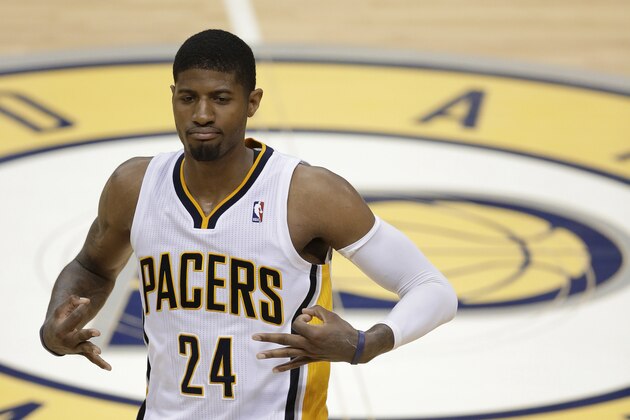 Indiana Pacers' Paul George gestures after hitting a 3-point shot during the second half of Game 5 of the Eastern Conference finals NBA basketball playoff series against the Miami Heat on Wednesday, May 28, 2014, in Indianapolis. (AP Photo/Darron Cummings)