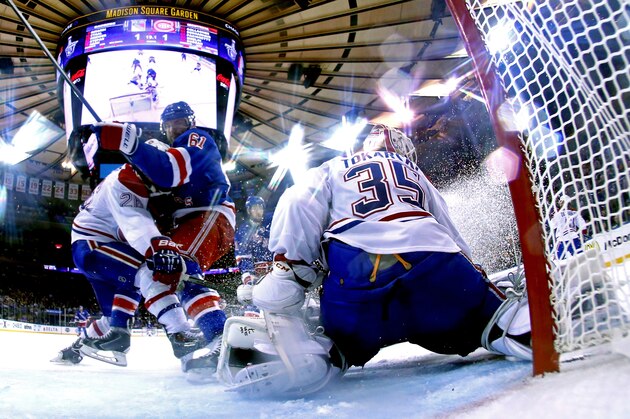 NEW YORK, NY - MAY 22:  Dustin Tokarski #35 of the Montreal Canadiens defends the net against Rick Nash #61 of the New York Rangers in Game Three of the Eastern Conference Final during the 2014 NHL Stanley Cup Playoffs at Madison Square Garden on May 22, 2014 in New York City.  (Photo by Al Bello/Getty Images)