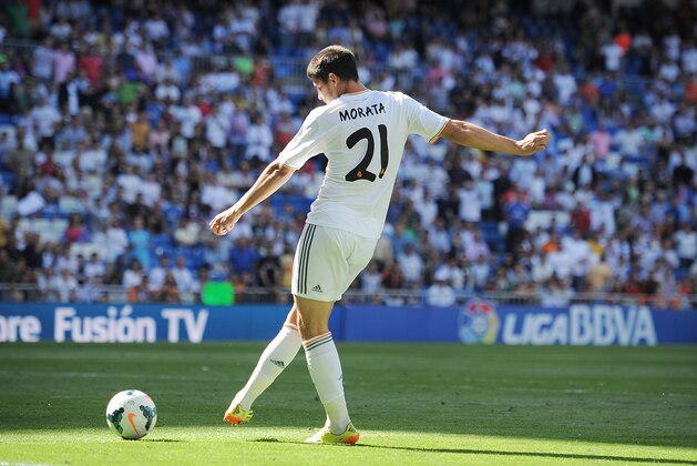 MADRID, SPAIN - MAY 17:  Alvaro Morata of Real Madrid FC scores Real's third goal during the La Liga match between Real Madrid CF and RCD Espanyol at Santiago Bernabeu stadium on May 17, 2014 in Madrid, Spain.  (Photo by Denis Doyle/Getty Images)