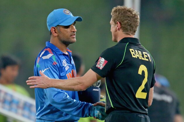 DHAKA, BANGLADESH - MARCH 30:  George Bailey of Australia shakes hands with MS Dhoni of India after the ICC World Twenty20 Bangladesh 2014 match between India v Australia at Sher-e-Bangla Mirpur Stadium on March 30, 2014 in Dhaka, Bangladesh.  (Photo by Scott Barbour/Getty Images)