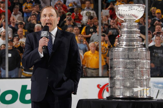 BOSTON, MA - JUNE 24:  NHL commissioner Gary Bettman speaks to the crowd before presenting the Stanley Cup trophy to the Chicago Blackhawks after they defeated the Boston Bruins 3-2 in Game Six of the 2013 Stanley Cup Final at TD Garden on June 24, 2013 in Boston, Massachusetts. The Chicago Blackhawks won the series 4-2 to win the Stanley Cup.  (Photo by Dave Sandford/NHLI via Getty Images)
