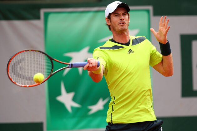 PARIS, FRANCE - MAY 29:  Andy Murray of Great Britain returns a shot during his men's singles match against Marinko Matosevic of Australia on day five of the French Open at Roland Garros on May 29, 2014 in Paris, France.  (Photo by Clive Brunskill/Getty Images)