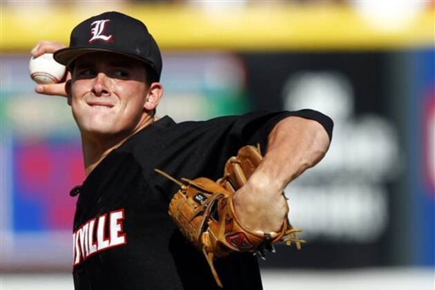 FILE - In this June 8, 2013, file photo, Louisville pitcher Nick Burdi throws to a Vanderbilt batter in the ninth inning of an NCAA super regional college baseball tournament game in Nashville, Tenn. (AP Photo/Wade Payne, File)