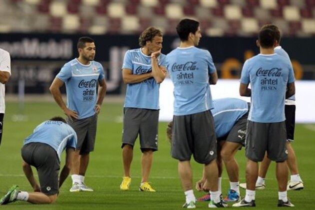Uruguay national football team players during a training session at the Khalifa International stadium in Doha on Tuesday, Feb. 5, 2013. Uruguay and Spain will play a friendly match on Feb. 6 in Qatar. (AP Photo/Osama Faisal)