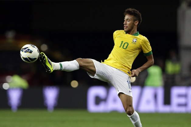 Brazil's Neymar tries to reach the ball during their friendly soccer match against South Korea at Seoul World Cup Stadium in Seoul, South Korea, Saturday, Oct.12, 2013. Brazil won 2-0. (AP Photo/Lee Jin-man)