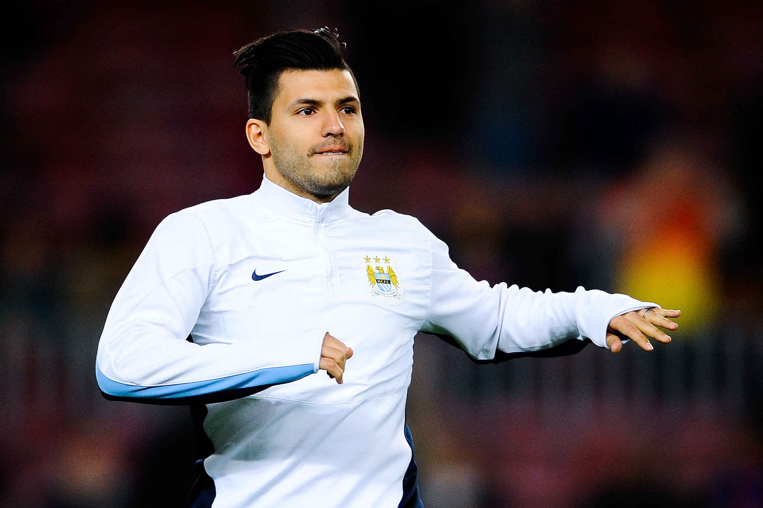 BARCELONA, SPAIN - MARCH 12:  Sergio Aguero of Manchester City FC warms up prior to the UEFA Champions League Round of 16 second leg match between FC Barcelona and Manchester City at Camp Nou on March 12, 2014 in Barcelona, Spain.  (Photo by David Ramos/Getty Images)