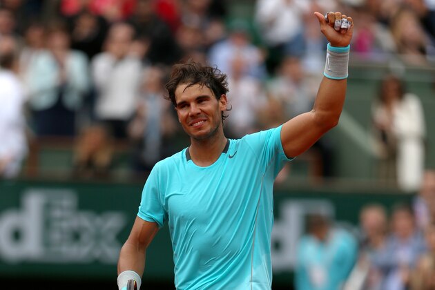 PARIS, FRANCE - MAY 29:  Rafael Nadal of Spain celebrates victory in his men's singles match against dominic thiem of Austria on day five of the French Open at Roland Garros on May 29, 2014 in Paris, France.  (Photo by Matthew Stockman/Getty Images)