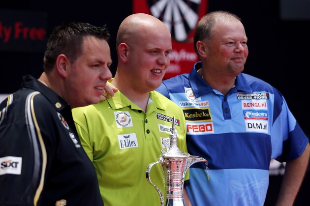 DUBAI, UNITED ARAB EMIRATES - MAY 28:  (L-R) Adrian Lewis of England, Michael Van Gerwen of the Netherlands and Raymond Van Barneveld of the Netherlands are pictured after the draw ceremony for the Dubai Duty Free Darts Masters to reveal the Quarter Final matches at Dubai Duty Free Tennis Stadium, Irish Village, on May 28, 2014 in Dubai, United Arab Emirates.  (Photo by Francois Nel/Getty Images)