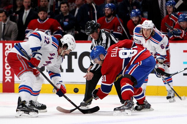 MONTREAL, QC - MAY 17:  Brian Boyle #22 of the New York Rangers and Lars Eller #81 of the Montreal Canadiens face off in Game One of the Eastern Conference Finals of the 2014 NHL Stanley Cup Playoffs at the Bell Centre on May 17, 2014 in Montreal, Canada.  (Photo by Francois Laplante/FreestylePhoto/Getty Images)