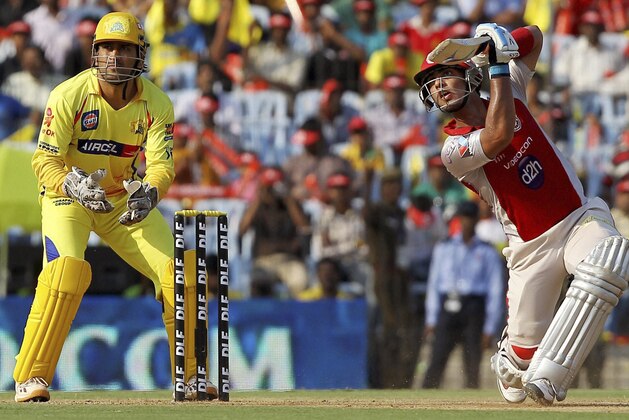 Kings XI Punjab's Mandeep Singh plays a shot during their Indian Premier League (IPL) cricket match against Chennai Super Kings, in Chennai, India, Sunday, April 28, 2012. (AP Photo) INDIA OUT