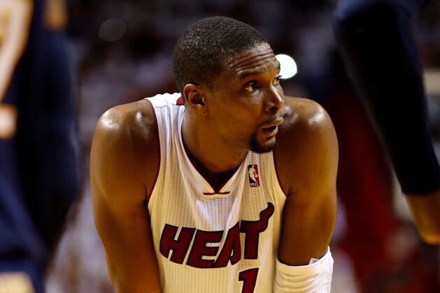 MIAMI, FL - MAY 26: Chris Bosh #1 of the Miami Heat looks on against the Indiana Pacers during Game Four of the Eastern Conference Finals of the 2014 NBA Playoffs at American Airlines Arena on May 26, 2014 in Miami, Florida. NOTE TO USER: User expressly acknowledges and agrees that, by downloading and or using this photograph, User is consenting to the terms and conditions of the Getty Images License Agreement.  (Photo by Mike Ehrmann/Getty Images)