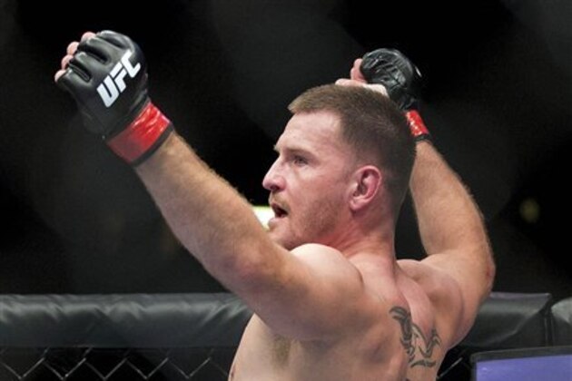 Stipe Miocic reacts after winning by knockout over Shane Del Rosario in the second round during a UFC 146 heavyweight bout on Saturday, May 26, 2012, in Las Vegas. (AP Photo/Julie Jacobson)