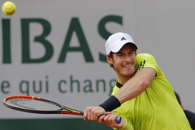 Britain's Andy Murray returns in his second round match of the French Open tennis tournament against Australia's Marinko Matosevic at the Roland Garros stadium, in Paris, France, Thursday, May 29, 2014. Murray won in three sets 6-3, 6-1, 6-3. (AP Photo/Michel Spingler)