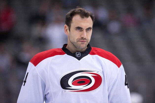 Feb 27, 2014; Dallas, TX, USA; Carolina Hurricanes defenseman Jay Harrison (44) skates in warm-ups prior to the game against the Dallas Stars at the American Airlines Center. The Stars defeated the Hurricanes 4-1. Mandatory Credit: Jerome Miron-USA TODAY Sports