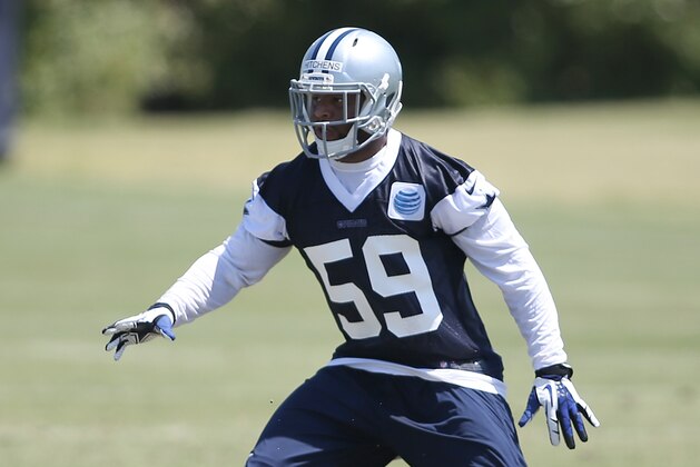 IRVING, TX - MAY 16: Anthony Hitchens #59 of the Dallas Cowboys runs drills during Dallas Cowboy rookie minicamp at Dallas Cowboys Headquarters in Irving on May 16, 2014 in Irving Texas. (Photo by Rick Yeatts/Getty Images)