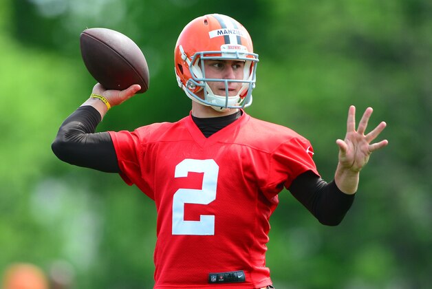 May 21, 2014; Berea, OH, USA; Cleveland Browns quarterback Johnny Manziel looks to pass during mini camp at Cleveland Browns practice facility. Mandatory Credit: Andrew Weber-USA TODAY Sports