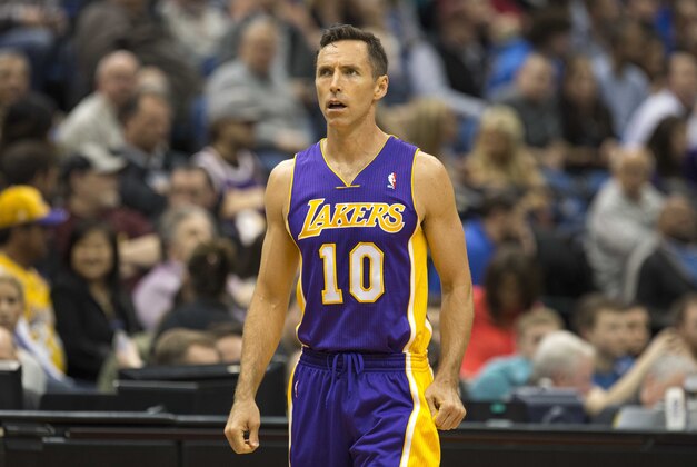 Mar 28, 2014; Minneapolis, MN, USA; Los Angeles Lakers guard Steve Nash (10) looks on during the second half against the Minnesota Timberwolves at Target Center. The Timberwolves won 143-107. Mandatory Credit: Jesse Johnson-USA TODAY Sports