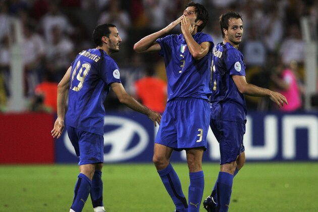 DORTMUND, GERMANY - JULY 04:  Fabio Grosso (C) of Italy celebrates scoring his team's first goal in extra time during the FIFA World Cup Germany 2006 Semi-final match between Germany and Italy played at the Stadium Dortmund on July 04, 2006 in Dortmund, Germany.  (Photo by Alex Livesey/Getty Images)