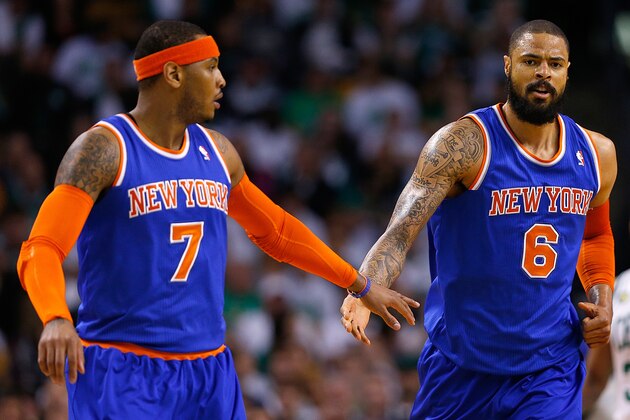 BOSTON, MA - MAY 3: Carmelo Anthony #7 of the New York Knicks shakes hands with Tyson Chandler #6 in the first half against the Boston Celtics in Game Six of the Eastern Conference Quarterfinals of the 2013 NBA Playoffs on May 3, 2013 at TD Garden in Boston, Massachusetts. NOTE TO USER: User expressly acknowledges and agrees that, by downloading and or using this photograph, User is consenting to the terms and conditions of the Getty Images License Agreement. (Photo by Jim Rogash/Getty Images)