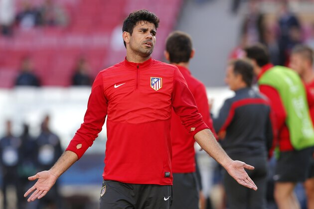 Atletico's Diego Costa gestures, during a training session ahead of Saturday's Champions League final soccer match between Real Madrid and Atletico Madrid, in Luz stadium in Lisbon, Portugal, Friday, May 23, 2014. (AP Photo/Daniel Ochoa de Olza)