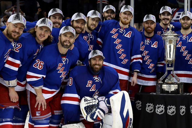 NEW YORK, NY - MAY 29:  Henrik Lundqvist #30 of the New York Rangers and the rest of the team pose with the Prince of Wales Trophy after defeating the Montreal Canadiens in Game Six to win the Eastern Conference Final in the 2014 NHL Stanley Cup Playoffs at Madison Square Garden on May 29, 2014 in New York City. The New York Rangers defeated the Montreal Canadiens 1 to 0.  (Photo by Bruce Bennett/Getty Images)