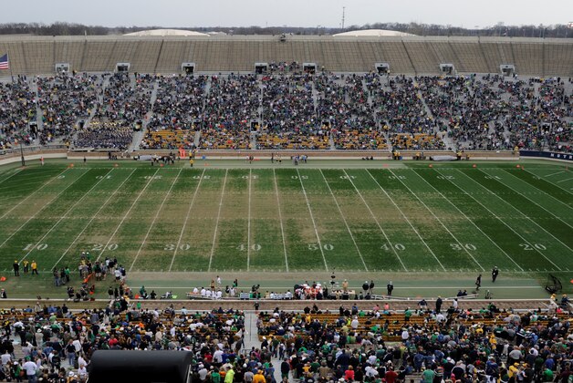 The field at Notre Dame Stadium during half time in Notre Dame's spring NCAA collegefootball game Saturday April 12, 2014 in South Bend, Ind. The Blue Gold game marks the end of spring football practice. Artificial turf will be installed at the stadium in time for the start of the upcoming football season, athletic director Jack Swarbrick said. (AP Photo/Joe Raymond)