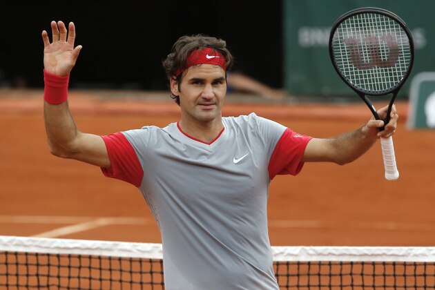 Switzerland's Roger Federer celebrates winning the third round match of the French Open tennis tournament against Russia's Dmitry Tursunov at the Roland Garros stadium, in Paris, France, Friday, May 30, 2014. Federer won in four sets 7-5, 6-7, 6-2, 6-4. (AP Photo/Michel Euler) Switzerland's Roger Federer celebrates winning the third round match of the French Open tennis tournament against Russia's Dmitry Tursunov at the Roland Garros stadium, in Paris, France, Friday, May 30, 2014. Federer won in four sets 7-5, 6-7, 6-2, 6-4. (AP Photo/Michel Euler)