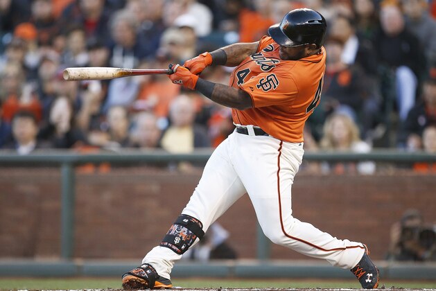 San Francisco Giants' Pablo Sandoval hits a three-run home run off Minnesota Twins starting pitcher Kyle Gibson in the first inning of a baseball game Friday, May 23, 2014, in San Francisco. (AP Photo/Tony Avelar)