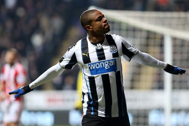 Newcastle United's Loic Remy celebrates his goal during their English Premier League soccer match against Stoke City at St James' Park, Newcastle, England, Thursday, Dec. 26, 2013. (AP Photo/Scott Heppell)
