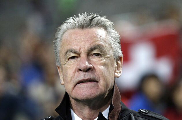 Switzerland's national soccer team coach Hitzfeld Ottmar stands before their friendly soccer match against South Korea at Seoul World Cup Stadium in Seoul, South Korea, Friday, Nov. 15, 2013. (AP Photo/Lee Jin-man)