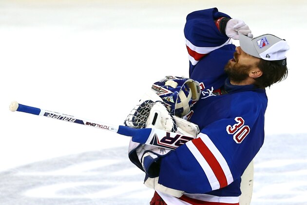 NEW YORK, NY - MAY 29:  Henrik Lundqvist #30 of the New York Rangers celebrates after defeating the Montreal Canadiens in Game Six to win the Eastern Conference Final in the 2014 NHL Stanley Cup Playoffs at Madison Square Garden on May 29, 2014 in New York City. The New York Rangers defeated the Montreal Canadiens 1 to 0.  (Photo by Elsa/Getty Images)