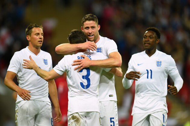 LONDON, ENGLAND - MAY 30: Gary Cahill of England celebrates scoring their second goal with Leighton Baines, Phil Jagielka and Danny Welbeck of England uring the international friendly match between England and Peru at Wembley Stadium on May 30, 2014 in London, England.  (Photo by Shaun Botterill/Getty Images)