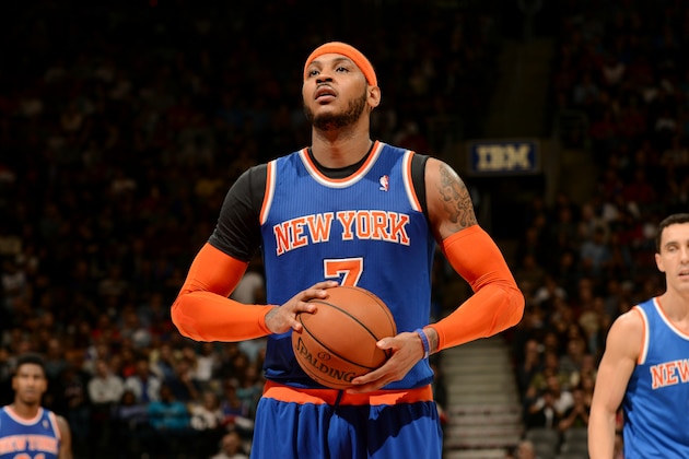 TORONTO, CANADA - April 11: Carmelo Anthony #7 of the New York Knicks attempts a free throw against the Toronto Raptors on April 11, 2014 at the Air Canada Centre in Toronto, Ontario, Canada.  NOTE TO USER: User expressly acknowledges and agrees that, by downloading and or using this Photograph, user is consenting to the terms and conditions of the Getty Images License Agreement.  Mandatory Copyright Notice: Copyright 2014 NBAE (Photo by Ron Turenne/NBAE via Getty Images)