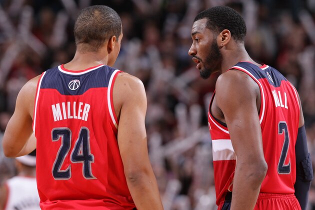 PORTLAND, OR - MARCH 20: Andre Miller #24 and John Wall #2 of the Washington Wizards on the court during the game against the Portland Trail Blazers on March 20, 2014 at the Moda Center Arena in Portland, Oregon. NOTE TO USER: User expressly acknowledges and agrees that, by downloading and or using this photograph, user is consenting to the terms and conditions of the Getty Images License Agreement. Mandatory Copyright Notice: Copyright 2014 NBAE (Photo by Sam Forencich/NBAE via Getty Images)